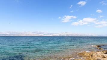 Beach nearby, sun loungers