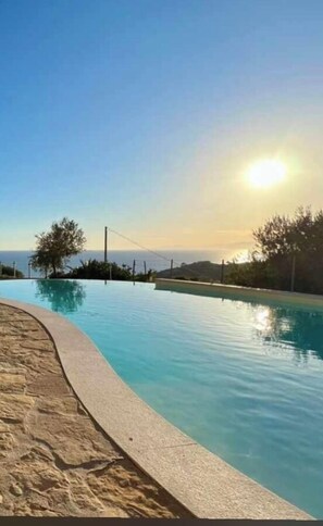 Outdoor pool, sun loungers