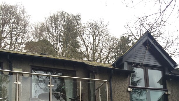A two-story house with a balcony and large windows. - Paradise in the Lake District. (Skelwith Bridge, Ambleside)