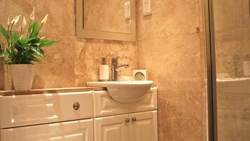 Shower, jetted bath, hair dryer, bidet