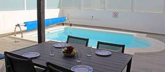 Villa Mariesa – Stylish 2-Bedroom Retreat with Heated Pool & Balcony