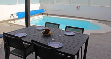 Villa Mariesa – Stylish 2-Bedroom Retreat with Heated Pool & Balcony