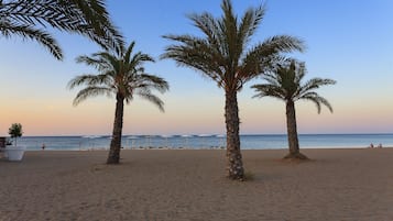 Beach nearby, sun loungers
