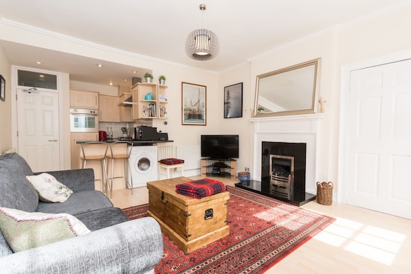 Smart TV, fireplace, DVD player, books