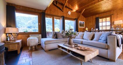 Alpine tranquillity from a large chalet with a sunny garden & beautiful views