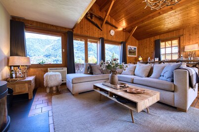 Alpine tranquillity from a large chalet with a sunny garden & beautiful views