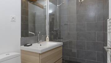 Hair dryer, towels, soap, shampoo