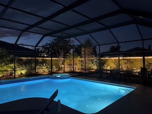 Outdoor pool, a heated pool, sun loungers