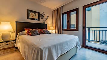 3 dormitorios, caja fuerte, tabla de planchar con plancha