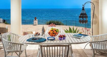 Waterfront villa with panoramic terrace and garden