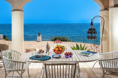 Waterfront villa with panoramic terrace and garden