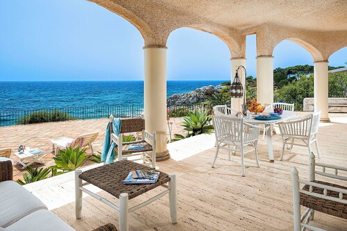 Waterfront villa with panoramic terrace and garden