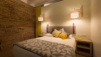 2 dormitorios, caja fuerte, tabla de planchar con plancha