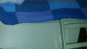 Cozy bunks with a ladder for easy access.