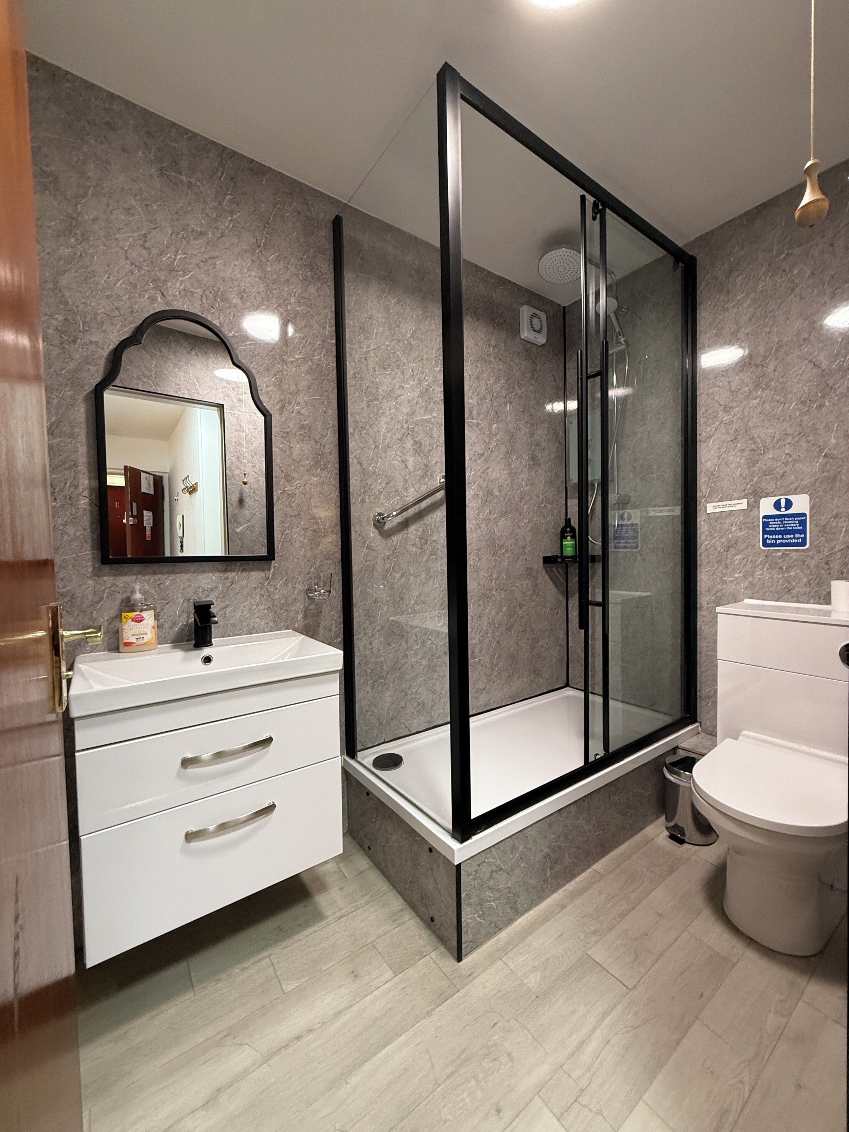 Combined shower/bathtub, hair dryer, towels, soap