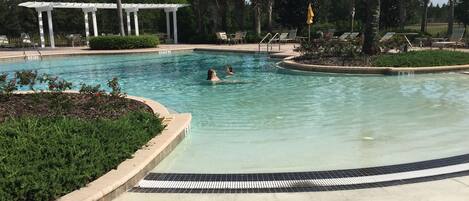 Outdoor pool, a heated pool, sun loungers