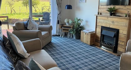 Heron Lodge, edge of Mabie Forest with breathtaking surrounding views Sleeps 4 .