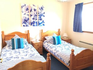 2 slaapkamers, een strijkplank/strijkijzer, gratis wifi, beddengoed