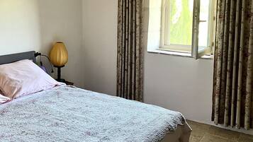 2 bedrooms, desk, iron/ironing board, travel crib