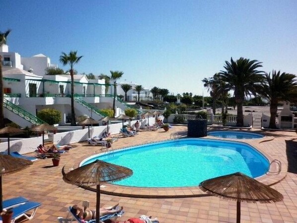 Outdoor pool, a heated pool, pool loungers