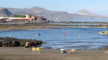 Una spiaggia nelle vicinanze, teli da spiaggia