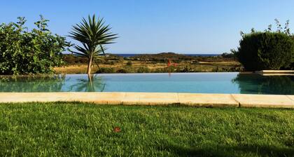 Villa in Chia. Infinity private pool & garden, 500m from seaside. Great Panorama