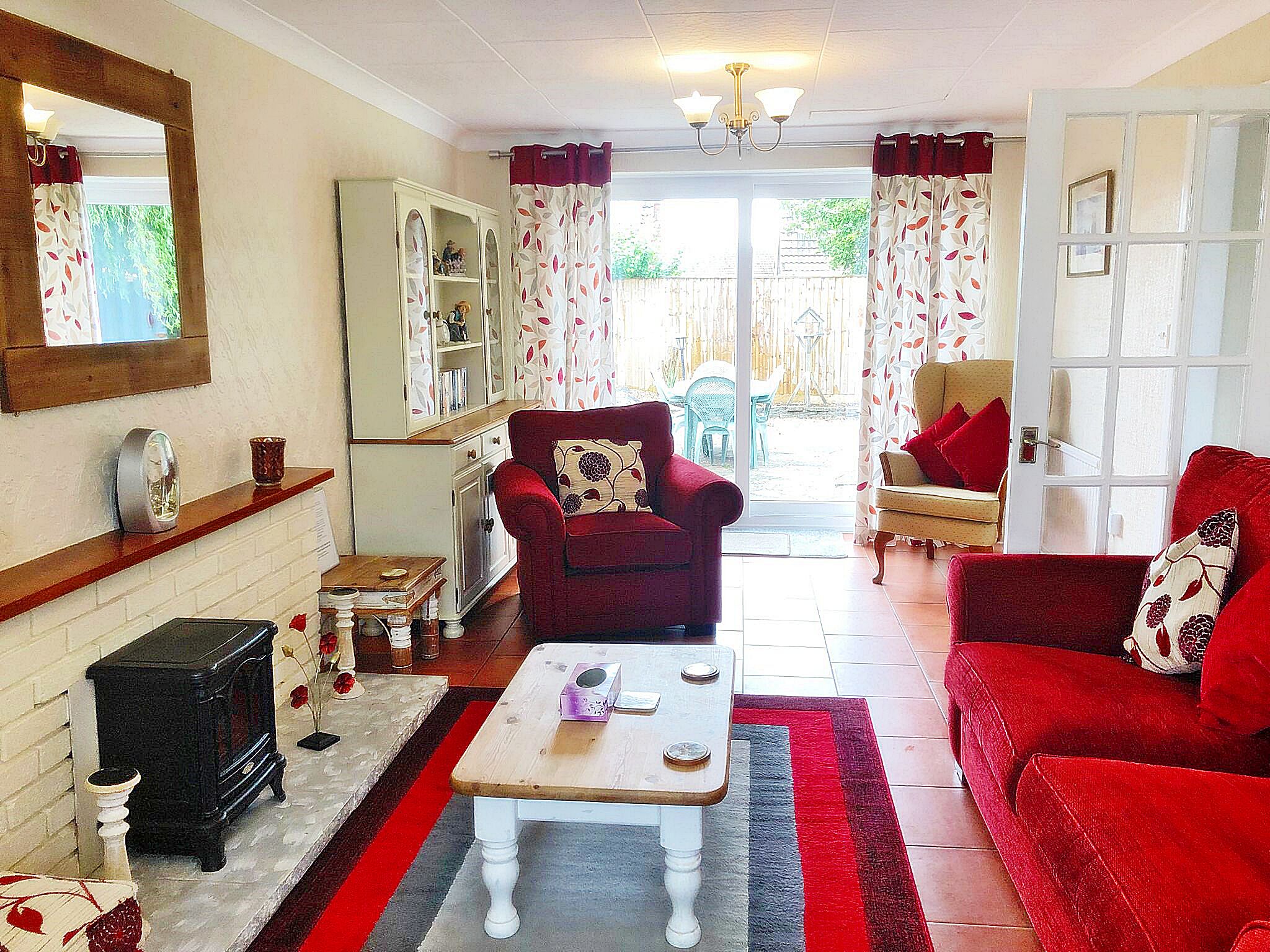 Smart TV, fireplace, DVD player, books