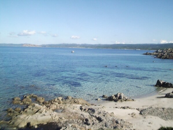 Enjoy breathtaking views of the sea and rocky shoreline from this serene coastal retreat.