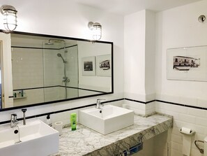 Shower, hair dryer, towels, soap