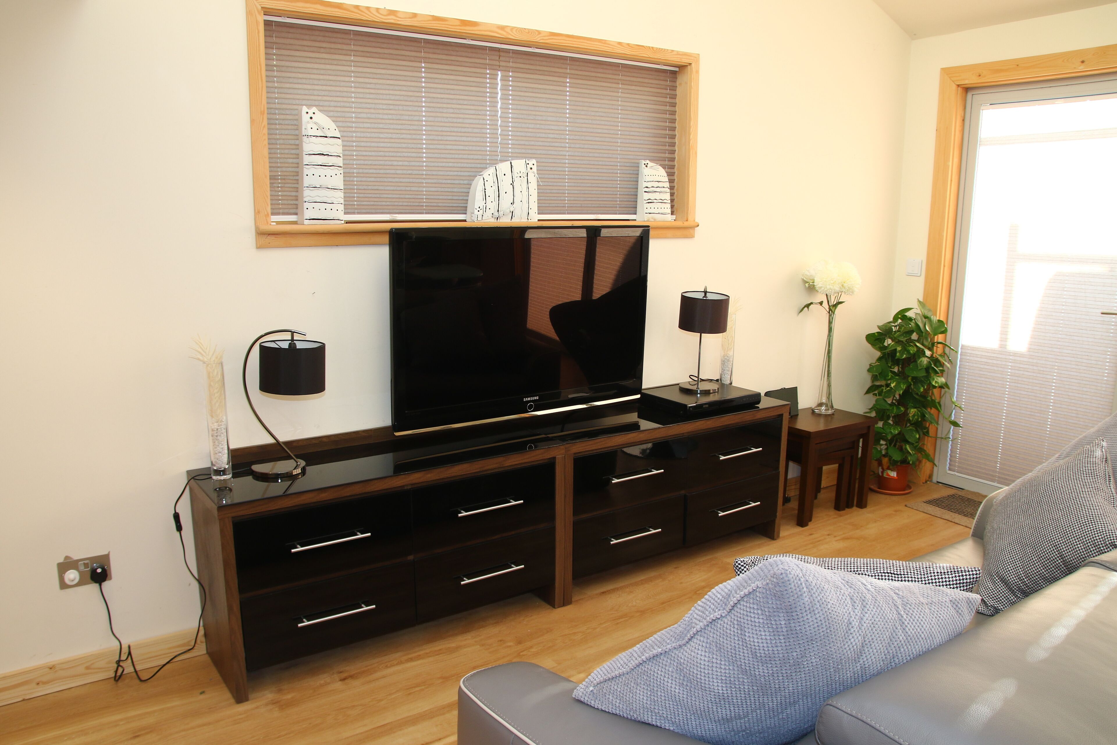 Comfortable lounge with large flat screen TV
