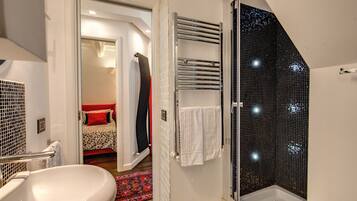 Hair dryer, towels, soap, shampoo