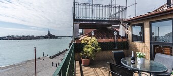 BIANCIAL PENTHOUSE WITH SPLENDID TERRACE SOLARIUM OVERVIEW OF THE LAGOON 