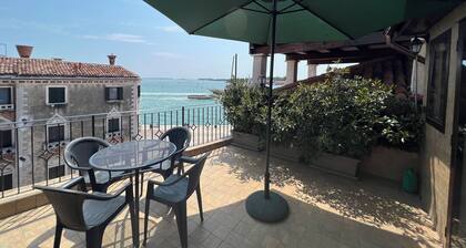 BIANCIAL PENTHOUSE WITH SPLENDID TERRACE SOLARIUM OVERVIEW OF THE LAGOON