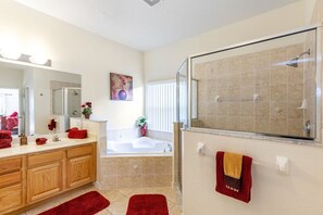 Bathtub, hair dryer, towels, soap