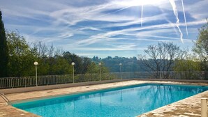 A rectangular swimming pool with clear blue water, surrounded by a brick deck and metal railings. - CHARMING VILLA 💖Panoramic views of sea & mountain, private sunny terraces, pool (Saint-Paul-De-Vence)