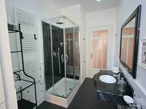 Shower, eco-friendly toiletries, hair dryer, bidet