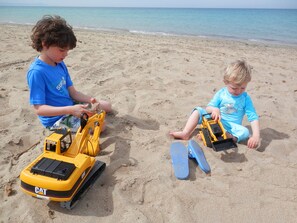 Perto da praia, toalhas de praia 