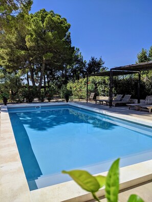 Piscine abris soleil amovible 
