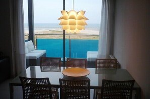 View from property - Frontline penthouse with pool & parking and incredible views on quiet beach (Cubelles)