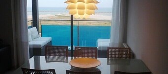 Frontline penthouse with pool & parking and incredible views on quiet beach