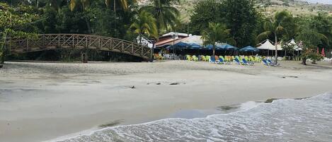 On the beach, sun loungers, beach towels