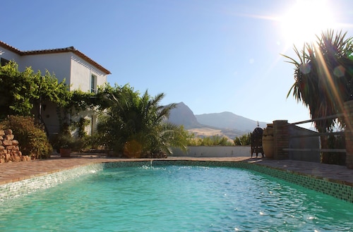 Farmhouse In Privileged Location, with private pool and established gardens.