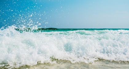 Villa Tramonto with sea view veranda surrounded by greenery with A/C and wifi