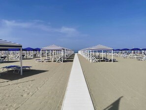 Sun-loungers, beach towels