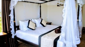 Ropa de cama de alta calidad, minibar, caja fuerte y escritorio