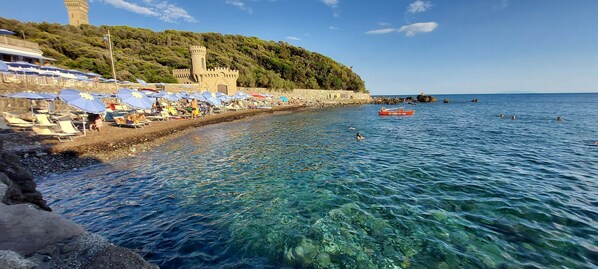 Beach nearby, sun loungers