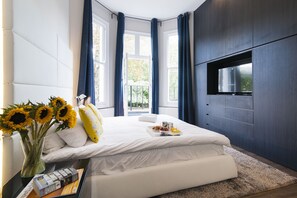 2 dormitorios, caja fuerte, tabla de planchar con plancha y wifi