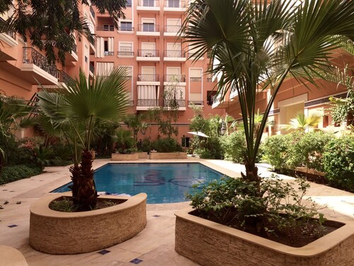 City center, air-conditioned apartment in secure residence with swimming pool.