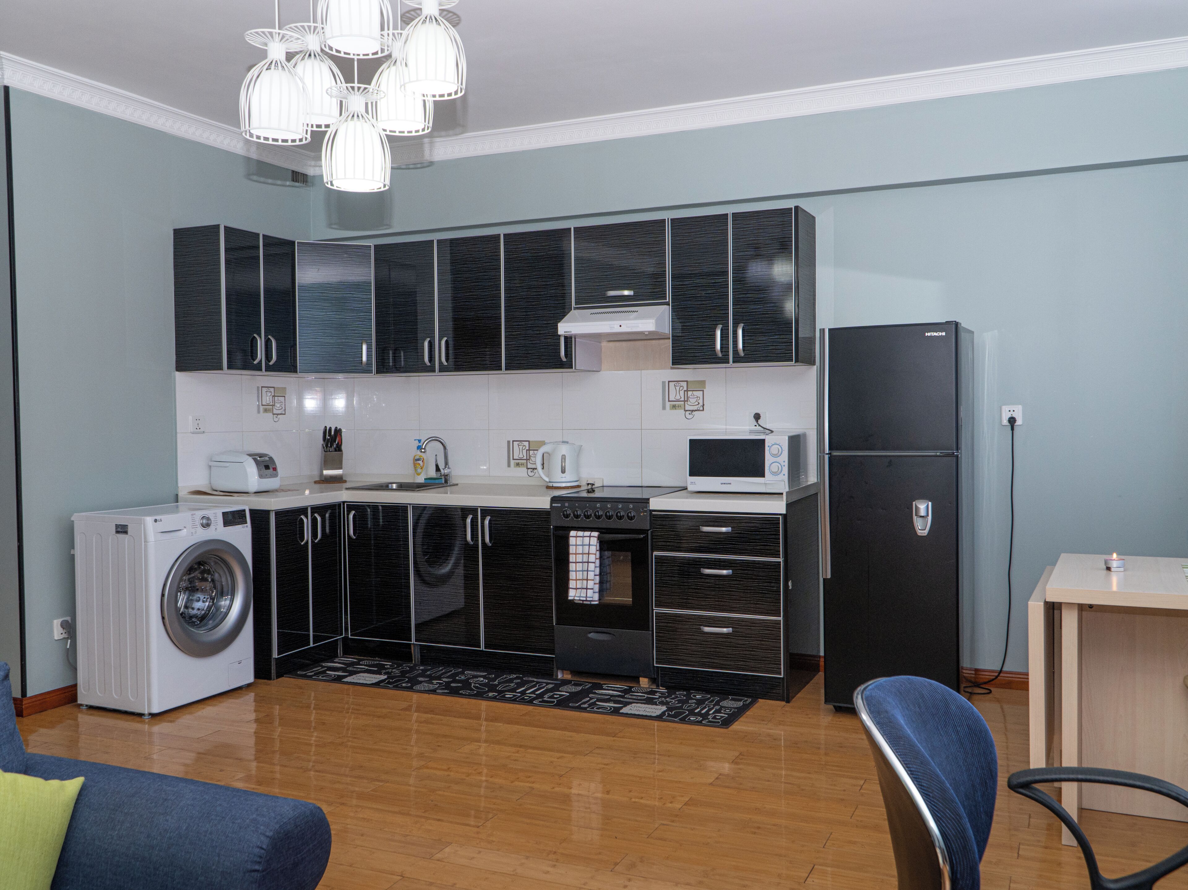 Deluxe Studio | Private kitchen | Fridge, microwave, oven, stovetop