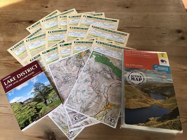 A collection of maps and a guidebook for Lake District walks.